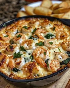 a casserole dish filled with shrimp and cheese