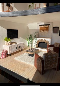 a living room filled with furniture and a fire place in the middle of a room