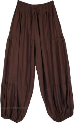 These perfect pair of loose rayon harem pants - without the usual tie-dye - might just be what you need for the season, with their comfy fabric and snug waist they are sure to make you feel great - whatever your mood.  The pants have an elastic waist and elastic on the ankles for ease of comfort. #tlb #SplitSkirtsPants #Yoga #hippieharempants #gypsyhippiepants #hippiewidelegpants Harem Pant Outfits, Brown Ankle-length Harem Pants With Elastic Waistband, Brown Harem Pants For Summer, Solid Cotton Bohemian Harem Pants, Solid Bohemian Cotton Harem Pants, Bohemian Brown Harem Pants For Spring, Brown Bohemian Ankle-length Harem Pants, Bohemian Brown Ankle-length Harem Pants, Baggy Brown Harem Pants