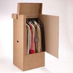 an open cardboard box with clothes in it