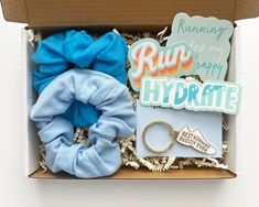 open gift box including 3 sticker, 2 scrunchies and 1 keychain Good Christmas Gifts For Runners, Runner Party Bag Gifts, Long Dostance Runner Gifts, Runner Boyfriend Gifts, Runner Gift Basket, Runners Gift Basket, Cross Country Gift, Runner Gifts, Marathon Gift