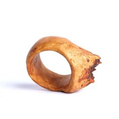 a wooden ring that has been carved to look like an animal's teeth