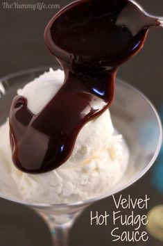 an ice cream sundae with chocolate sauce on top