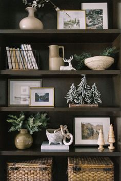 the shelves are filled with pictures and other things to decorate in their home or office