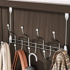 a coat rack with several coats hanging on it