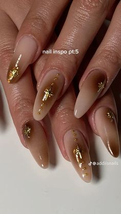 Brown Gel Nails Almond, Brown Nails Ideas Aesthetic, Simple Nail With Gem, Brown Celestial Nails, Unique Nail Designs Fall, Minimalist Nails Almond Fall, Brown Y2k Nails Acrylic, Dark Red Nails With Gold Design, Gold Sticker Nails