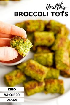 broccoli tots on a white plate being held up