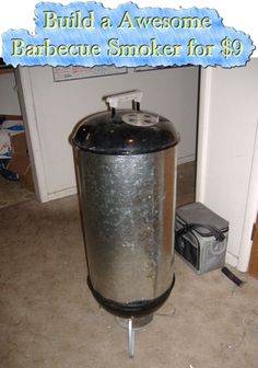 a large metal tank sitting on top of a floor next to a box and other items