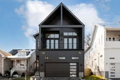 two story house with garage in residential area