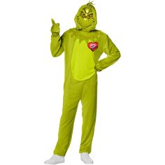 a person in a green costume giving the peace sign