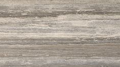 a close up view of a marble counter top with grey and white stripes on it