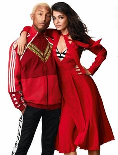 a man and woman standing next to each other in front of a white background wearing adidas