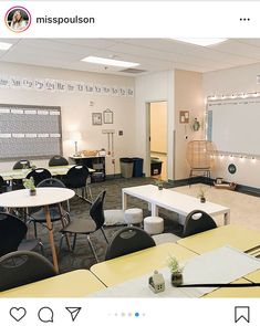 an empty classroom is shown with tables and chairs in front of a whiteboard on the wall