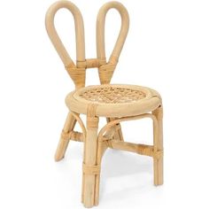 a chair made out of bamboo and wicker with two curved backrests on the seat