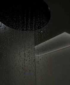 rain is falling down on the shower head