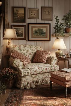 a living room filled with furniture and pictures on the wall