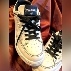 Arguably One Of The Most Popular Chanel Sneakers Styles To Date. Details Fabric & Suede Calfskin White Round Toe Cc Logo To The Side . Just Adorable !!! Chanel Sneakers Woman, Coco Chanel Tennis Shoes, Chanel White Sneakers, Chanel Sneakers For Sale, Chanel Shoes Sneakers & Athletic, Chanel Sneakers, Chanel White, Shoes Chanel, Trainer Sneakers