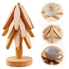 the wooden toy is shaped like a tree and has two cups on it, one with saucer and spoons