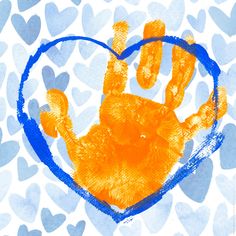 an orange handprint in the shape of a heart on a blue and white background