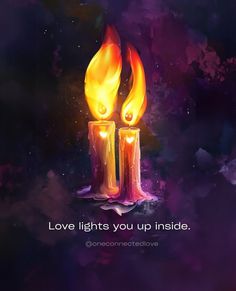 two lit candles with the words love lights you up inside on them, against a dark background