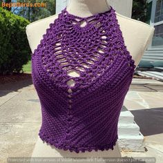 a purple crocheted top on a mannequin