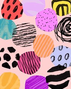 an image of many different colored circles on a pink background with black and white dots