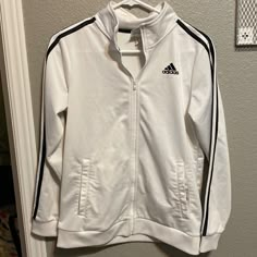 White Adidas Zip Up Super Comfy And Warm! Never Worn Size: Kids Large/ Women’s Small Always Up For Offers!! Fitted White Adidas Outerwear, White Long Sleeve Adidas Track Jacket, White Adidas Hooded Hoodie, Adidas Zip Up Hoodie, Doctor Outfit, Unisex Jacket, Black Zip Ups