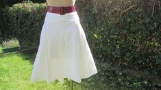 "This pretty skirt is perfect for spring, autumn and summer! DETAILS: summer skirt fabric: cotton color: white skirt with lining side zipper skirt with embroidery Very good vtg condition. Measurements lying flat are: Length: 25\" / 63,5cm Waist: 18\" / 45,7 cm PLEASE NOTE: \"Laying flat\" means that  \"waist\" NEED TO DOUBLED Estimated size: EUR44 UK16, but refer to measurements. Belt and blouse in photo are not included" Cotton A-line Bottoms For Day Out, Cotton Full Flowy Skirt, White Full Skirt For Summer, Summer Full Skirt Cotton Bottoms, Summer Cotton Full Skirt Bottoms, Summer Full Skirt Bottoms In Cotton, White Cotton Casual Skirt, Cotton Full Pleated Skirt, Summer Cotton Midi Skirt