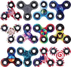 many different types of fidgets are shown in this image, including one with an american flag design on it