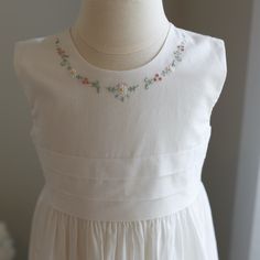 This Strasburg Classic Girls 100% Cotton Lawn Sundress Has Lovely Delicate Pastel Embroidery At The Neckline. The Waist Has Three French Tucks And A Tie-Back Sash. Dress Is Fully Lined And Has A Button Back. Strasburg Is Generously Sized So Has Room For Growth. Worn Once Briefly For Indoor Portraits. Perfect Timeless And Classy For Spring, Weddings, Portraits Or Any Special Occasion. These Dresses Are In Perfect Condition- Like New Rare And No Longer In Production-Original Strasburg Boutique!! S Sleeveless Floral Embroidered Baptism Dress, Pastel Embroidery, Float Dress, Floral Applique Dress, White Flower Dress, Velvet Party Dress, Heirloom Dresses, White Slip Dress, Girls White Dress