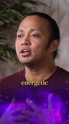 a man is holding his hand up in front of him with the words energetic on it