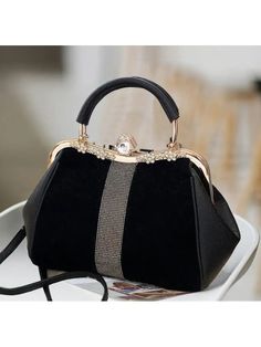 Imperial Black Lady Handbag – an accessory that seamlessly blends sophistication with practicality. Whether you're heading to the office, a social event, or a casual day out, this effortlessly adapts to your style. The versatility of its design allows you to pair it with a variety of outfits, making it a go-to accessory in your collection.Handbags Type: Shoulder BagsTypes of bags: Handbags & Crossbody bagsMain Material: PULining Material: PolyesterPattern Type: SolidInterior: Cell Phone PocketEx Chic Party Bags With Large Capacity, Black Top Handle Box Bag For Office, Luxury Black Handheld Evening Bag, Black Large Capacity Evening Bag, Black Spacious Evening Bag, Black Rectangular Office Bag, Black Shoulder Bag For Party With Large Capacity, Black Satchel Evening Bag With Large Capacity, Black Large Capacity Shoulder Bag For Party