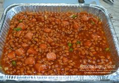 baked beans and carrots in a tin pan