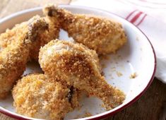 some fried food is in a red and white bowl