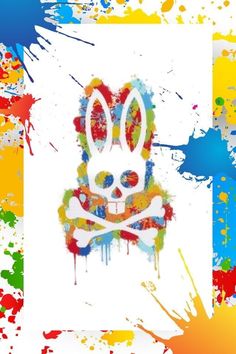 an image of a skull and crossbone with paint splattered on it's face