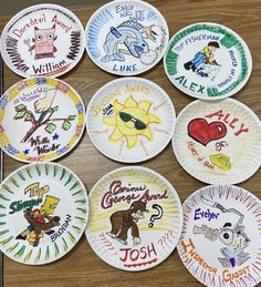 paper plates with different designs on them sitting on a table