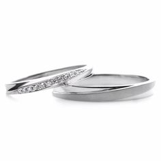 two white gold wedding rings with diamonds