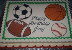 a birthday cake decorated with sports balls and the words happy birthday joey