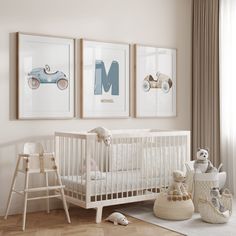 a baby's room with three pictures on the wall