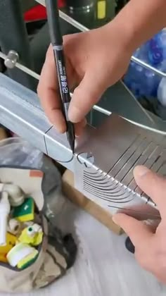 a person is using a grater to cut something