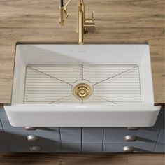 Elevate your kitchen's functionality with this rectangular fireclay bowl sink. Designed to resist scratches, stains, rust, heat, and fading, it's a practical yet stylish addition to your home. The sink comes with a stainless steel grid, complete with rubber pads to protect your dishes and the sink's surface. The sound-dampening feature ensures a quieter kitchen experience, while the single basin and faucet hole make installation a breeze. Keep in mind, the faucet and strainer are not included, s Deep Sink, Apron Sink Kitchen, Farmhouse Apron, Little Farmhouse, Farmhouse Aprons, Kitchen Layouts, Fireclay Sink, Kitchen Remodel Inspiration, Bowl Kitchen Sink