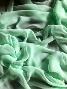 "1 mtr mint green chiffon fabric This is quality chiffon fabric It is 45\" wide (114cm) This is ideal for dress making,bridal dress, veils,decorations,and many other projects If more than one quantity is bought it will be sent in one continous length I also combine postage costs if multiple items are bought Any questions feel free to ask" Bridal Horseshoe, Pink Wedding Theme, Mint Green Dress, Dried Rose Petals, Bridal Fabric, Soft Dress, Blossom Design, Dress Chiffon, Stage Costume