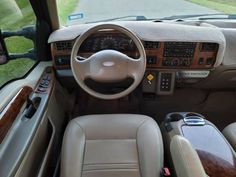 the interior of a vehicle with leather seats