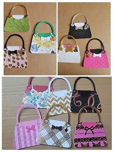 four different purses made out of paper