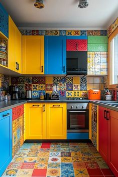 29 Elegant Apartment Kitchen Decor for a Luxe Touch Multi Color Kitchen Cabinets, Modern Tiny Apartment, Small Yellow Kitchen, Teal And Yellow Kitchen, Yellow And Green Kitchen, Kitchen Ideas Colorful, Kitchen Without Island, Tiny Apartment Kitchen, Kitchen Turquoise