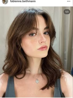 Wispy Medium Haircut, Shoulder Length Wavy Hair Curtain Bangs, Cute Medium Haircuts With Bangs, Medium Length Wavy Hair With Bangs Round Face, Volumizing Haircuts For Medium Length Hair, Soft Bangs Wavy Hair, Mid Length Brown Hair With Curtain Bangs, Haïr Cut With Side Bangs, Low Maintenance Bangs Wavy Hair