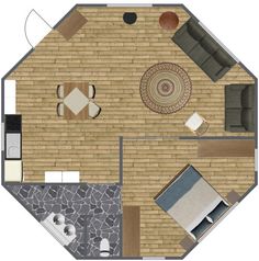 an overhead view of a living room and dining area in a small apartment with brick walls