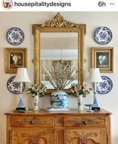 an ornate dresser with blue and white plates on it