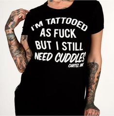 Show off your unique style with this eye-catching "i'm tattooed as fuck but still need cuddles" women's t-shirt. express your creative side with this goth-style t-shirt that is sure to turn heads. Need Cuddles, Gothic Pants, Pin Up Hair, T-shirts & Tank Tops, Edgy Look, Goth Fashion, Leather Leggings, Show Off, Flare Pants