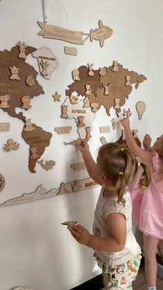 Searching for the perfect Christmas gift for a child that blends fun, learning, and creativity? Our Personalized Wooden World Map is the ultimate holiday present that doubles as beautiful room decor and an educational tool! Product Details: Handcrafted from high-quality birch plywood, this wooden world map is designed for children ages 1 and up. It encourages sensory play, creative thinking, and early geography knowledge through interactive elements and a DIY painting experience. What's Included: Map Sizes: XL (80x50 cm) or XXL (120x77 cm) Contents: 8 continents, 5 ocean names, a customizable airplane with the child's name, a compass, a ship, a balloon, and 20 or 40 animal figures (depending on size). Color Options: Available in four unique palettes to match any nursery or playroom. Langua Learning Wall, Map Nursery, Wooden World Map, Kids World Map, Maps For Kids, Unique Nursery, Christmas Gift For Kids, Playroom Wall Art, 1st Birthday Gifts